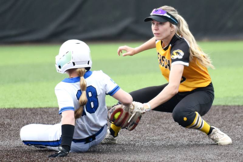 Herscher's Lexi Crawford, right, looks to tag Peotone's Madilyn Scheffers at second base during a Class 2A Manteno Regional quarterfinal at Herscher Monday, May 18, 2026.