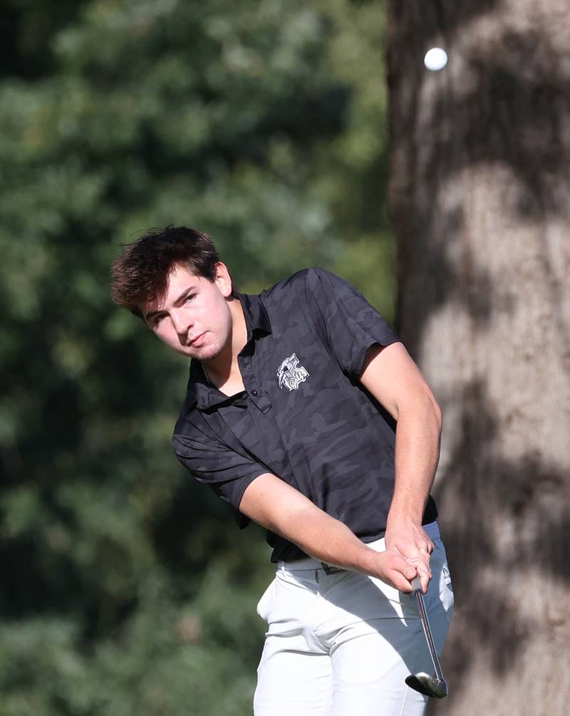 Kaneland’s Brayden Seaton chips onto the third green Monday, Sept. 23, 2024, during the Interstate 8 boys golf tournament at the Kishwaukee Country Club in DeKalb.
