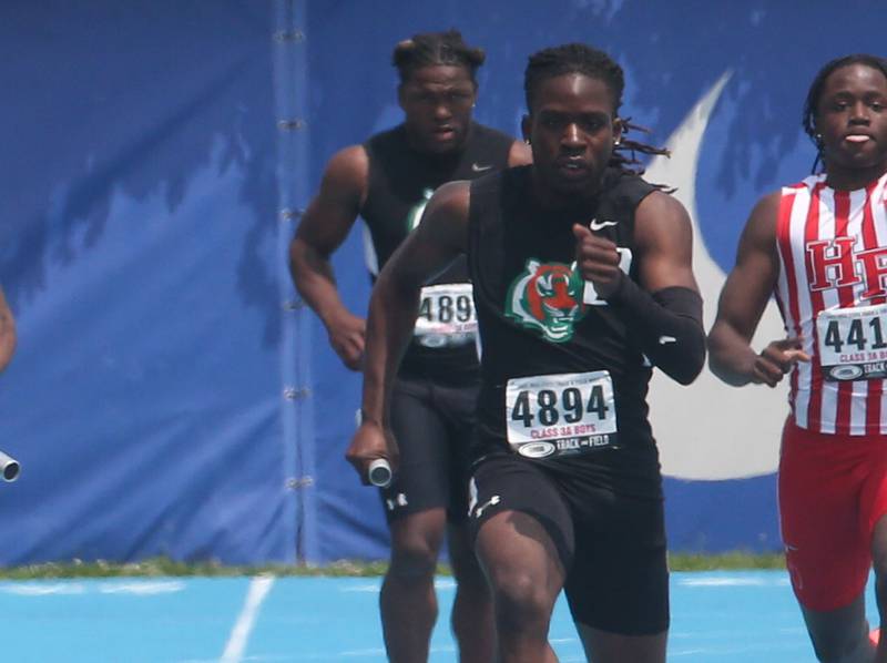 Plainfield East's Joe Owusu competes in the 4x100 meter relay during the IHSA Class 3A Boys Track & Field State Finals on Saturday, May 31, 2025 at Eastern Illinois University in Charleston.