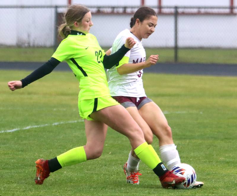 Marengo’s Amy Pineda, back, races Richmond-Burton’s Abbie Leslie to the ball in IHSA Class 1A Regional Title Game action soccer at Marengo High School in Marengo on Wednesday, May 21, 2025.