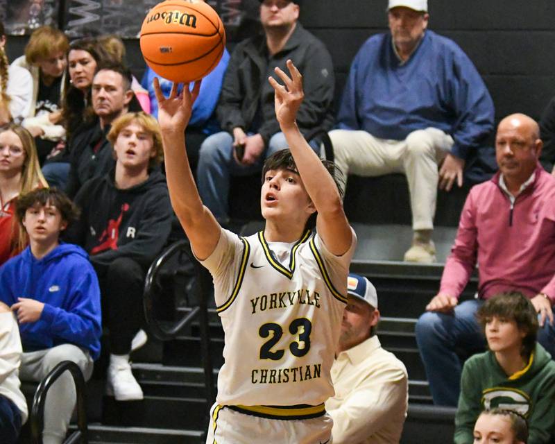 Yorkville Christian's Zach Marini (23) make a three-point basket during the game while taking on Aurora Christian on Friday Feb. 28, 2025, held at Indian Creek High School.