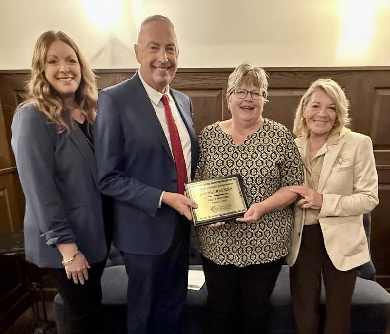 Beckett Lifetime Achievement Award winner Jay McCracken with daughter Megan, left, wife Kim, and SRCCF co-founder Pamela Beckett.