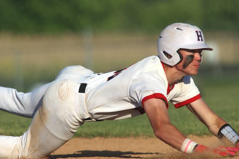 Huntley’s Kyle Larson legs out a triple against Barrington in sectional semifinal baseball action at Hampshire Wednesday.