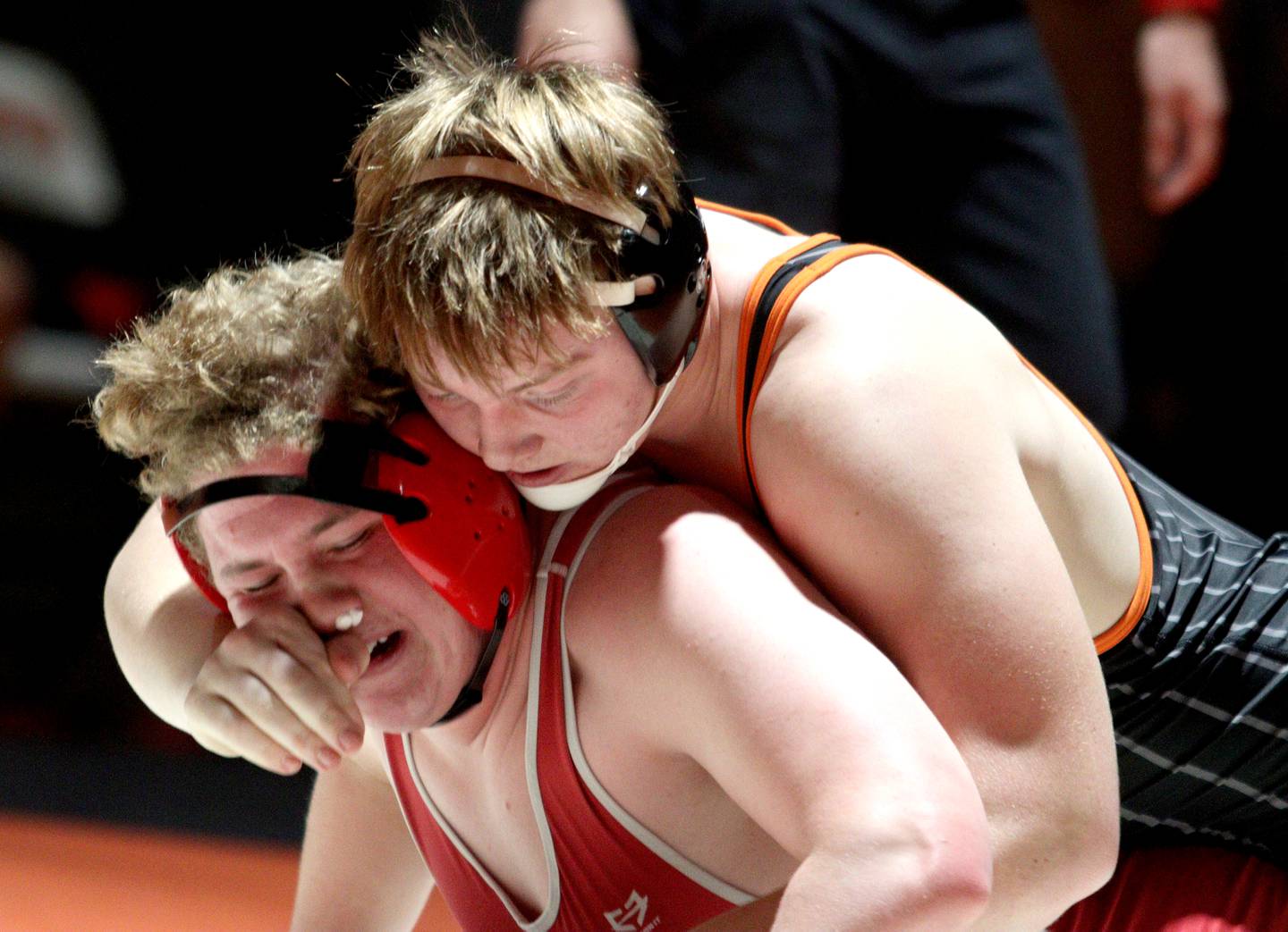 Crystal Lake Central’s Tommy McNeil, right, battles Huntley’s Dylan Cerny in a 215-pound bout in varsity wrestling at Crystal Lake Friday.  McNeil won the match.