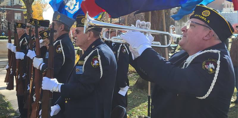 Ottawa American Legion Post 33 trumpeter Gary Wood offers his rendition of "Taps" at the conclusion of Monday's Veterans Day commemoration at Washington Square Park.