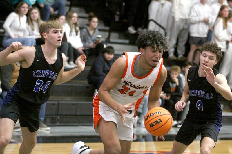 McHenry’s Adam Anwar moves the ball against Burlington Central’s in varsity boys basketball on Friday, Dec. 5, 2025, at McHenry Community High School in McHenry.