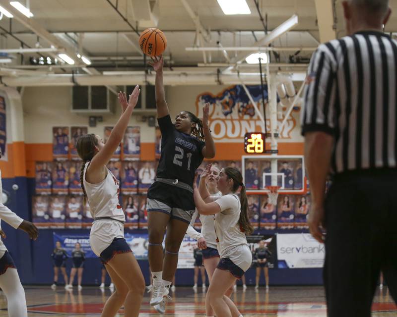 Oswego East's Desiree Merritt (21) puts up a shot during their basketball game between Oswego East at Oswego Friday, Jan 09, 2026 in Oswego.