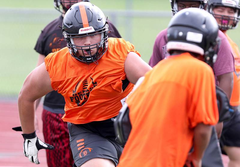 DeKalb's Nathan Hoard takes part in an offensive line drill Monday, Aug. 8, 2022, at the school during their first practice ahead of the upcoming season.