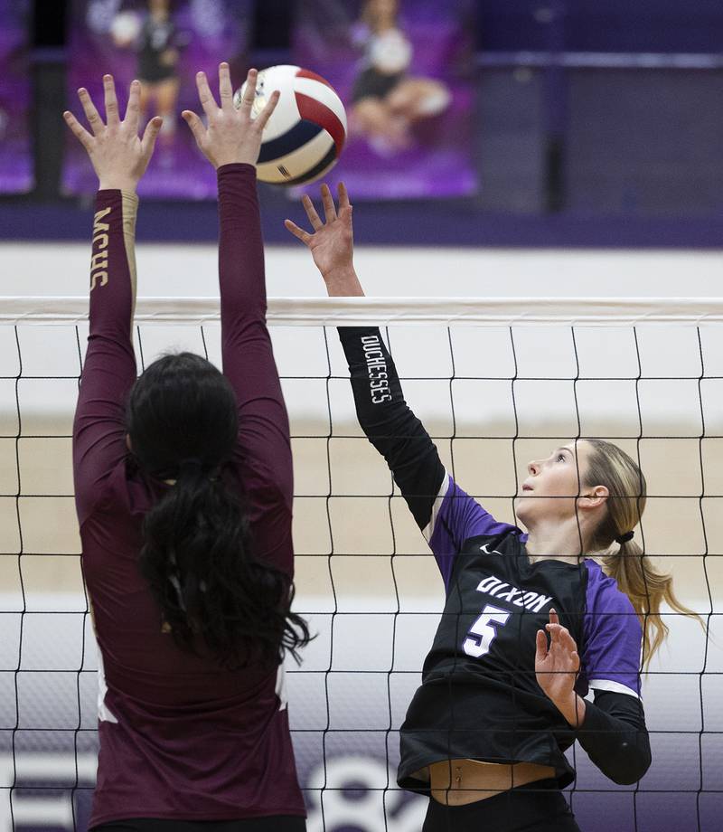 Dixon’s Morgan Hargrave tips the ball against Morris Thursday, Oct. 31, 2024 in the class 3A regional championship at Dixon High School.