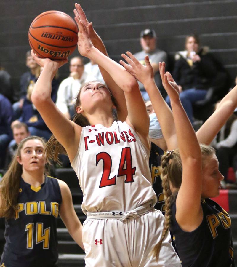 Indian Creek's Audrey Witte shoots over a Polo defender during their Class 1A regional game Tuesday, Feb. 15, 2022, at Indian Creek High School in Shabbona.
