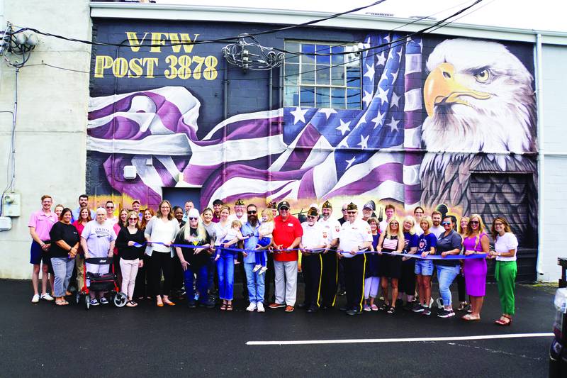 On Wednesday, June 25, a ribbon cutting was held for Rochelle VFW Post 3878’s new mural on the back of its building at 318 4th Ave.