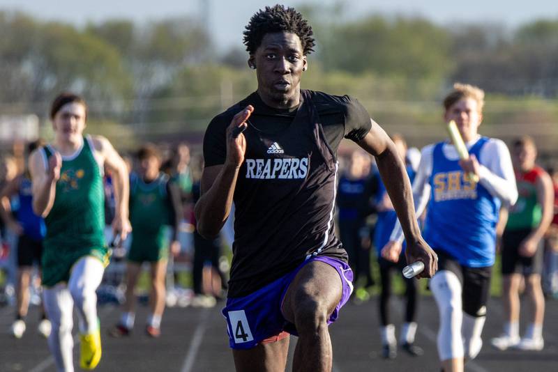 Plano's Christ Keleba heads for home in the 4x100 relay during Plano's Field of Dreams Invitational on Friday, April 19, 2024 in Plano.