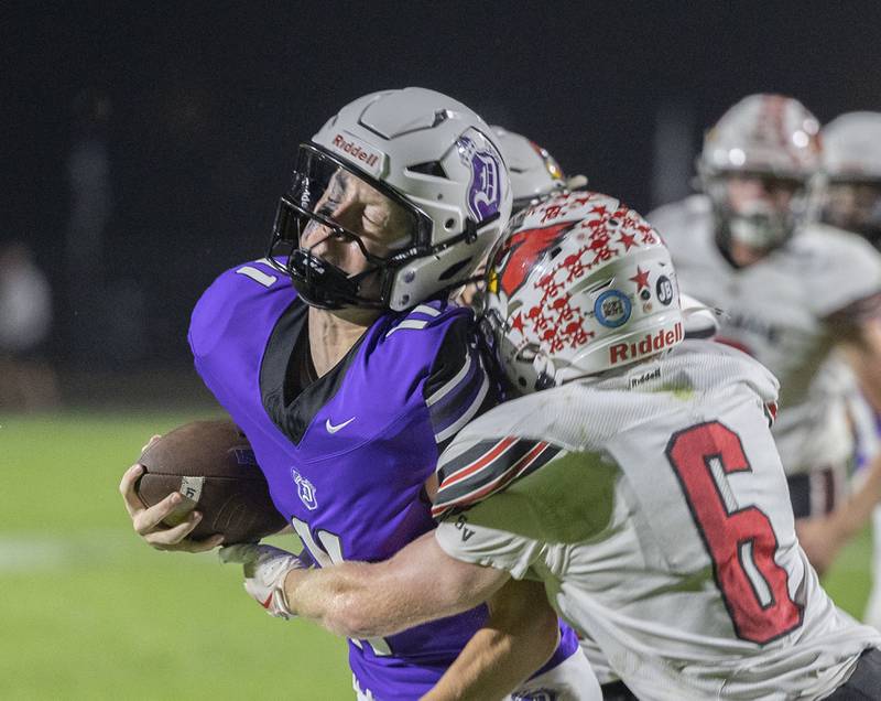 Dixon’s Jagger Kemp is hit just as he crosses the goal line for a TD against Stillman Valley Friday, Oct. 3, 2025.