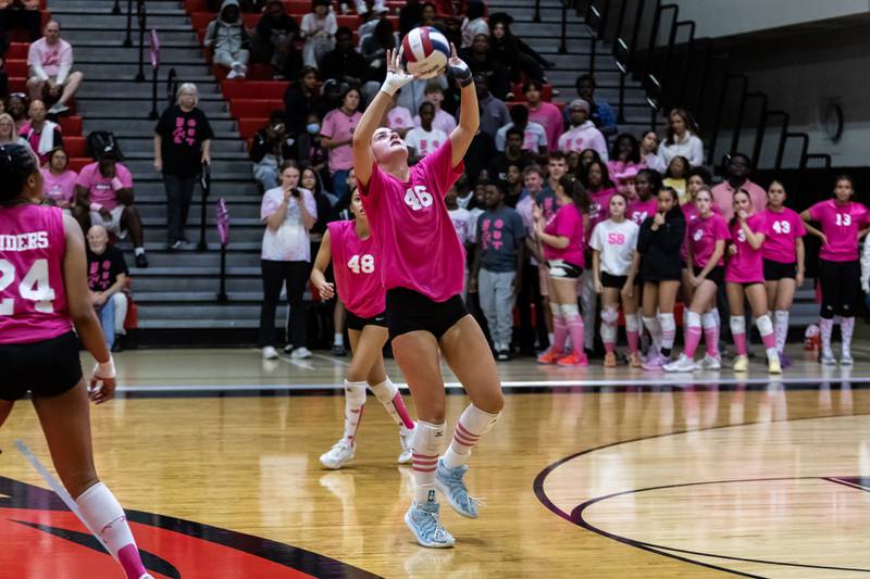 Bolingbrook's Catherine Daniels sets up a teammate during a varsity volleyball game against Joliet West at Bolingbrook on Oct. 16, 2025.
