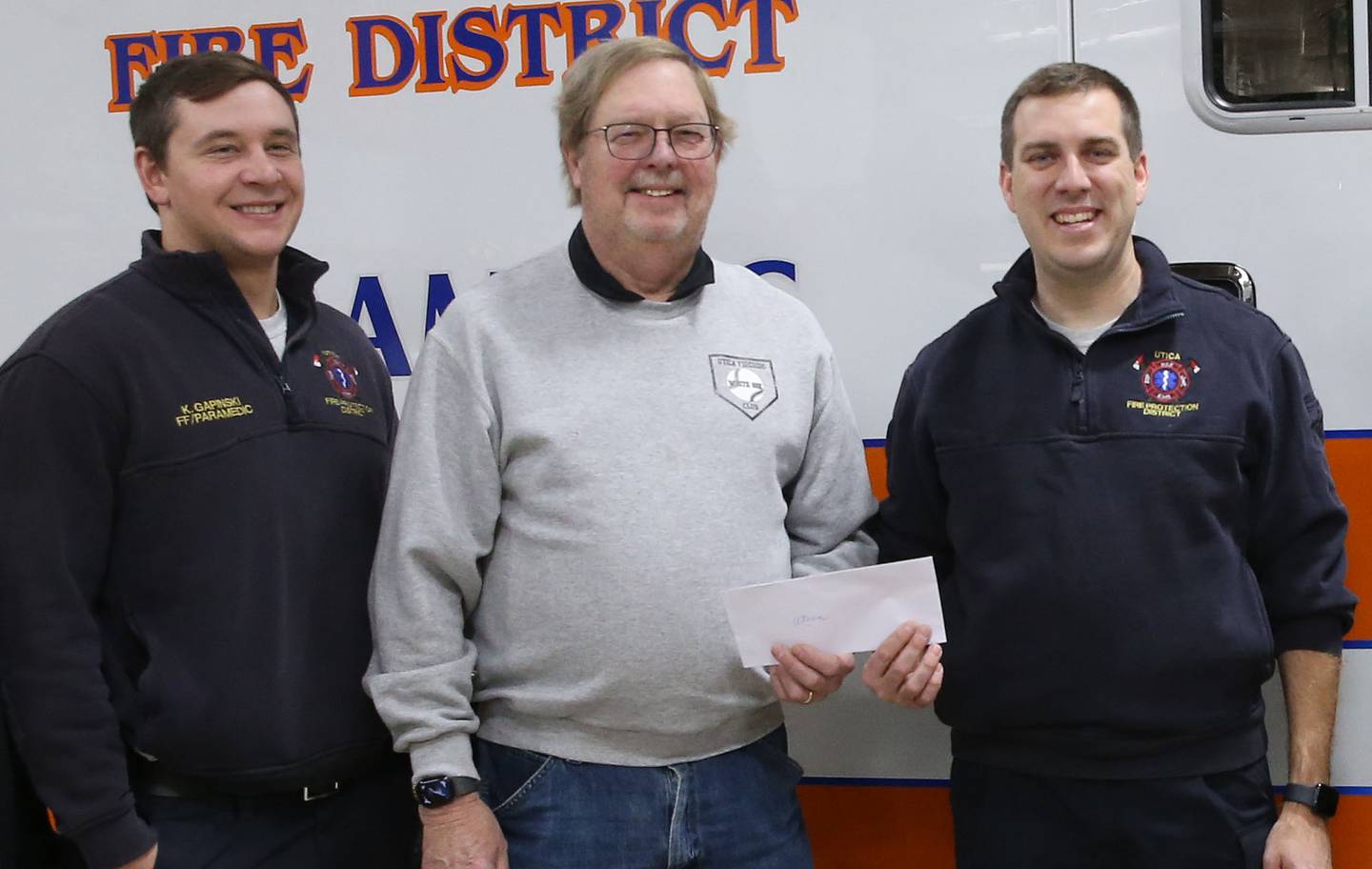 (From left) Utica firefighter Koty Gapinski, Utica Fireside White Sox Club member Dave Fowler, Utica Fire Chief Ben Brown,  presents a check of $1,000 to the Utica Fire Department and  Marseilles Ambulance Service on Tuesday, Jan. 7, 2025 at the Utica Fire Station. The Utica Fireside White Sox Club donated $1,000 to the Utica Ambulance Service and $1,000 to the Marseilles Ambulance Service to be used for life saving equipment only. The donation was made from the clubs 10th annual Christmas Banquet and Auction. In the last decade, the club has gave to organizations in La Salle, Peru, Oglesby, Utica and Marseilles.