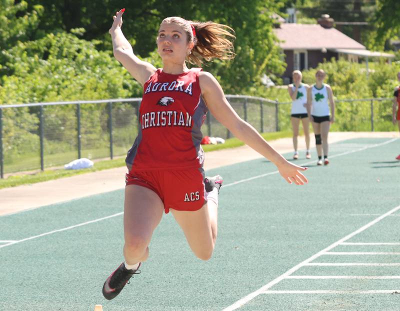 Aurora Christian's Payton Jewell competes in the long jump during the Class 1A Sectional meet on Thursday, May 14, 2026 at Seneca High School.
