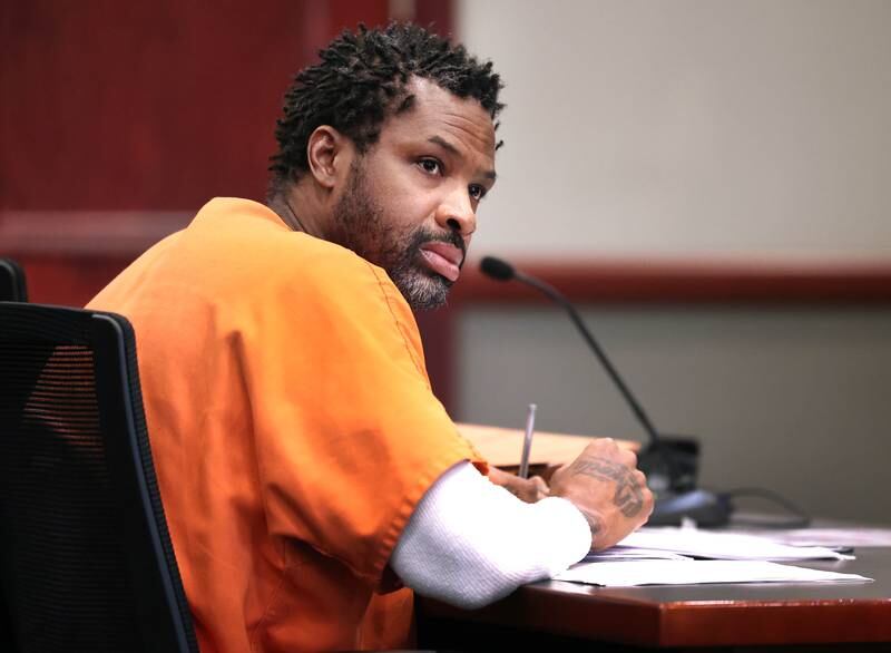Matthew L. Martin listens to lead prosecutor Daniel Regna during a pretrial hearing Thursday, April 3, 2025, at the DeKalb County Courthouse in Sycamore. Martin is charged with robbing a DeKalb bank in July 2024.