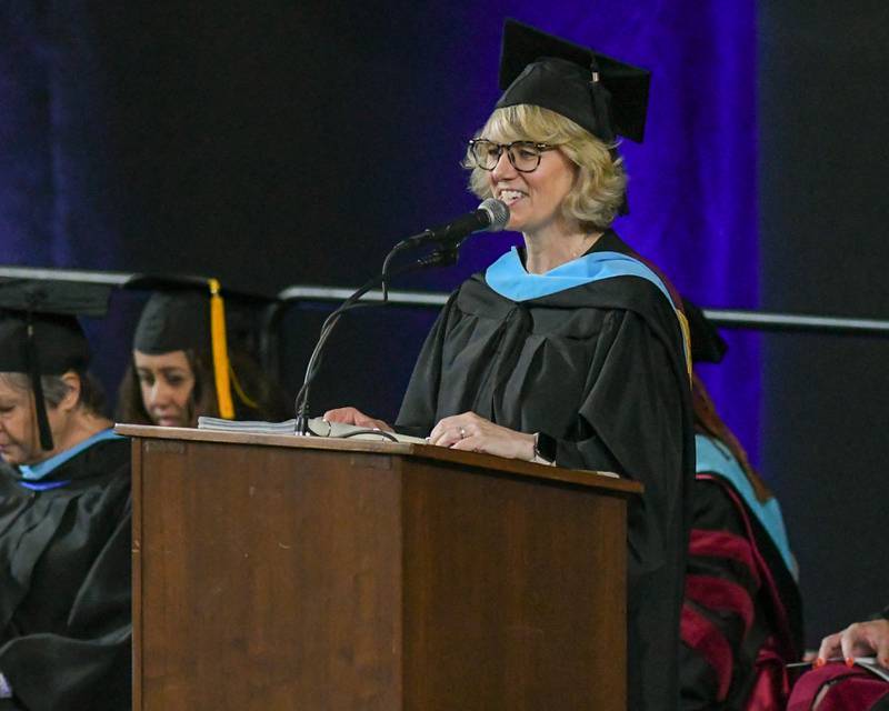 Oswego East’s principal Mrs. Laura Bankowski speaks during the graduation commencement ceremony on Saturday May 17, 2025, held at the Convocation Center in DeKalb.