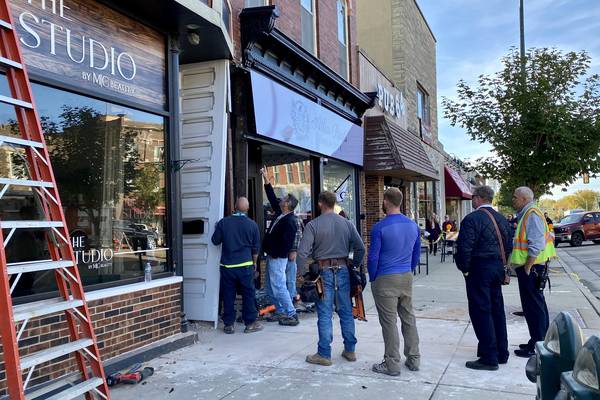 Two injured after Jeep crashes into downtown Sycamore building