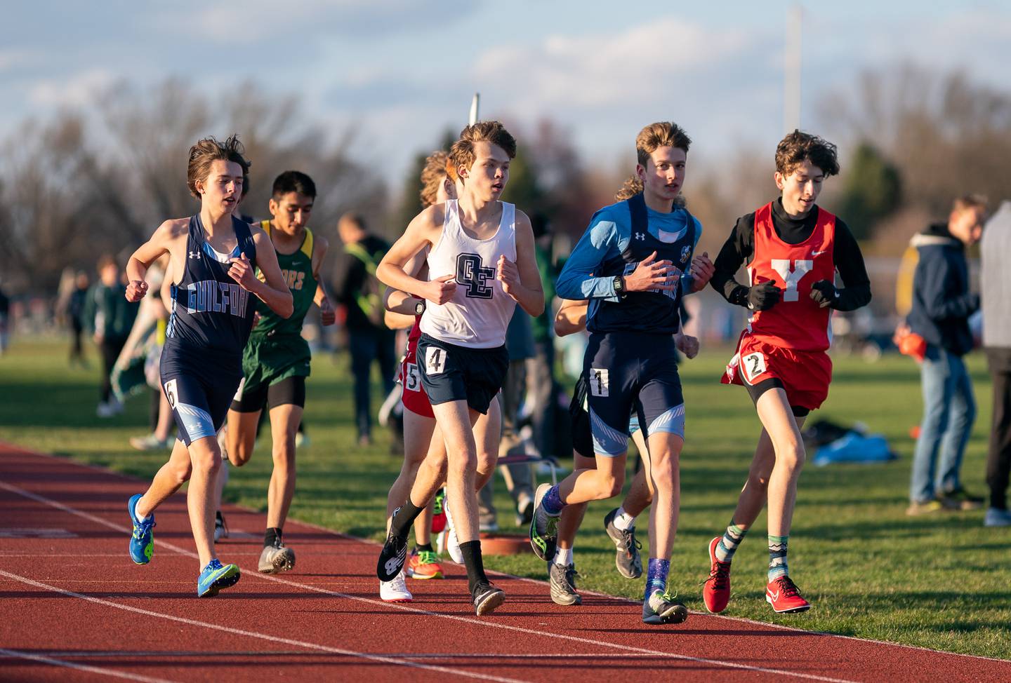 Runners compete in the 3200-meter race during the Matt Wulf Invitational track and field meet at Yorkville High School on Thursday, April 14, 2022.