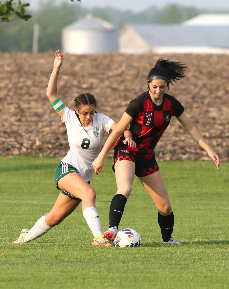 Indian Creek's Emma Wilson (right) tries to hold off Alleman's Eliza Kramer during their Class 1A sectional final game Friday, May 19, 2023, at Hinckley-Big Rock High School.