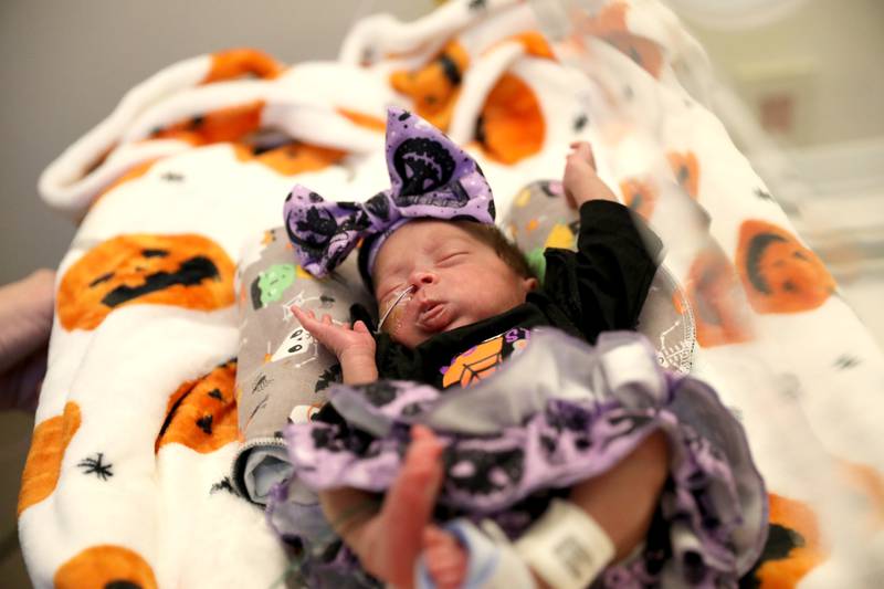 Aadhya Patel dressed in her Halloween best in the neonatal intensive care unit of Northwestern Central DuPage Hospital in Winfield on Tuesday, Oct. 31, 2023.