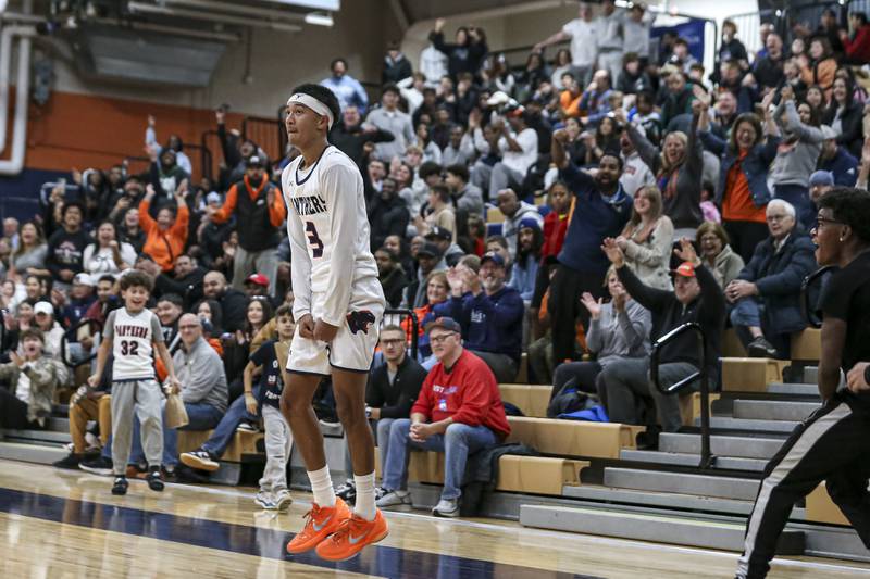 Oswego's Ethan Vahl (3) celebrates after scoring an and one basket during their basketball game between West Aurora at Oswego Monday, Nov 24, 2025 in Oswego.