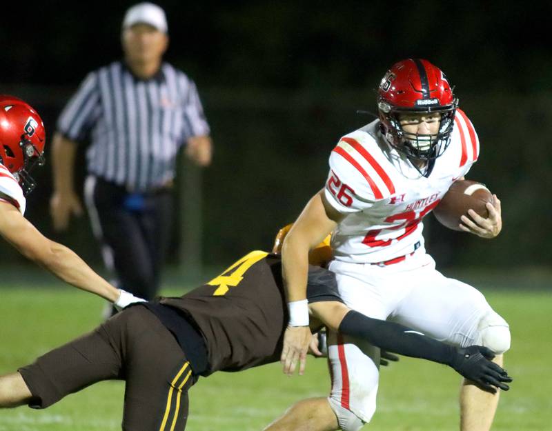 Huntley’s Chase Hojnacki runs the ball in varsity football at Jacobs High School in Algonquin on Friday, Sept. 26, 2025.