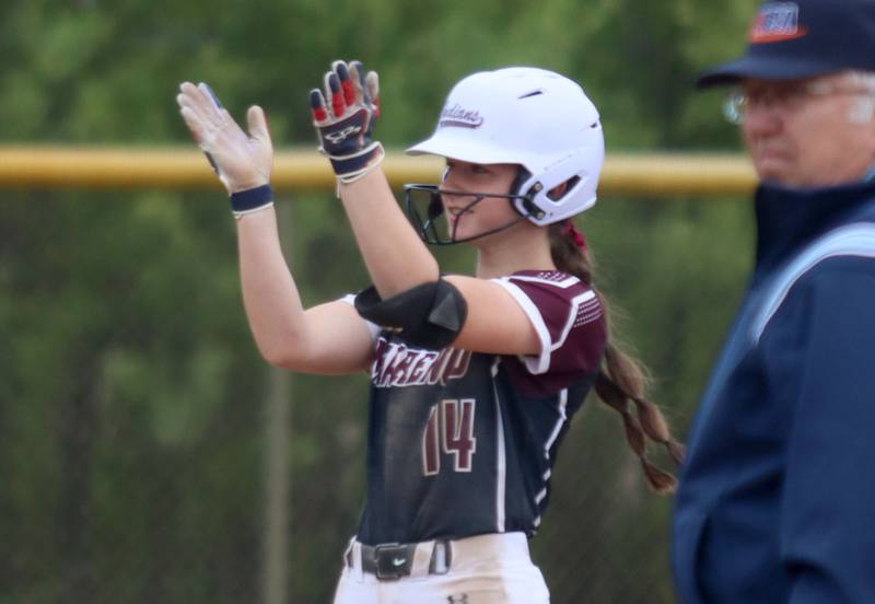 Marengo’s Abby Balmes celebrates a double against Aurora Central Catholic in varsity girls softball IHSA Class 2A Regional Title Game action on Friday, May 22, 2026 at Raymond Benoy Field on the campus of Marian Central High School in Woodstock.