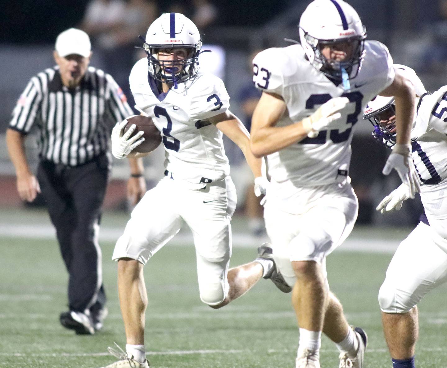 Cary-Grove’s Ty Tenopir runs the ball in for a touchdown in varsity football at Huntley High School in Huntley on Friday, Sept. 19, 2025.