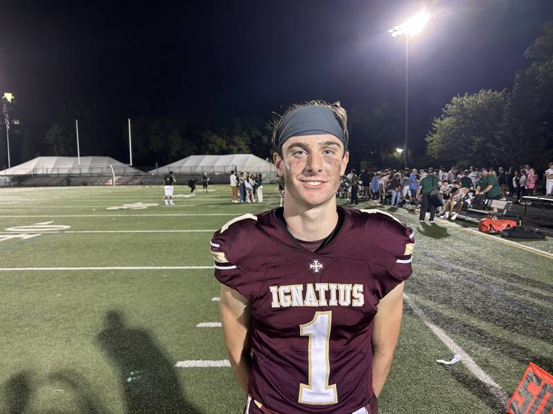 St. Ignatius quarterback Jack Wanzung threw and ran for a touchdown in the Wolfpack's 37-20 win over St. Patrick in Chicago on Friday.
