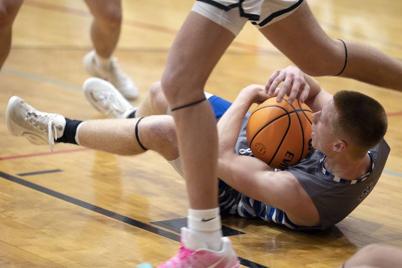 Newman’s George Jungerman tries to call timeout on a loose ball Byron Friday, Dec. 19, 2025, in the Forreston Holiday Tournament title game.