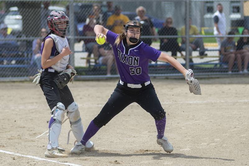 Dixon’s Elle Jarrett throws to first against Sterling on Saturday, May 28, 2022.
