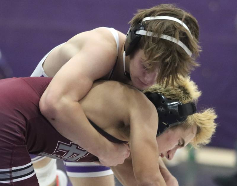 Hampshire’s William Randle-Zeglis, top, battles Prairie Ridge’s Andrew Cioper at 144 pounds in varsity wrestling on Thursday, Dec. 5, 2024 at Hampshire High School in Hampshire.