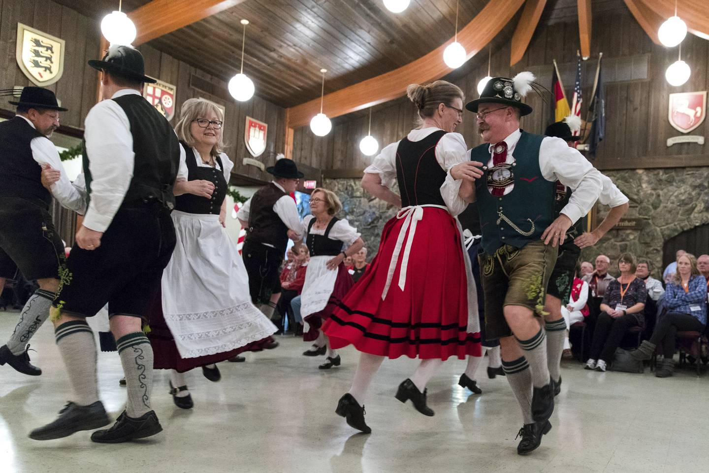 Dancers perform for tourists from Minnesota, Wisconsin and Illinois who arrived in buses to take part in the Christmas in Germany program in 2017 at the German-American Society in Omaha, Nebraska.