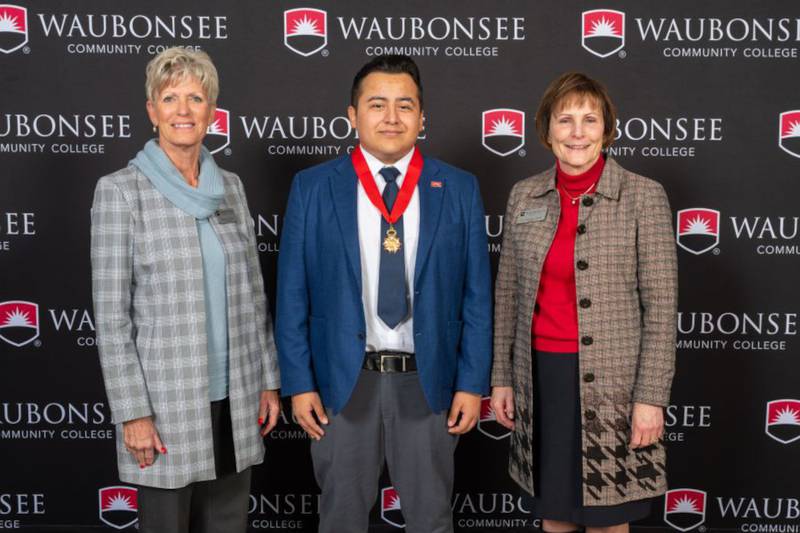 Pictured from left are Waubonsee Board of Trustees Chair Rebecca Oliver, Waubonsee Student Trustee Juan Chiu, and Waubonsee President Dr. Christine Sobek.