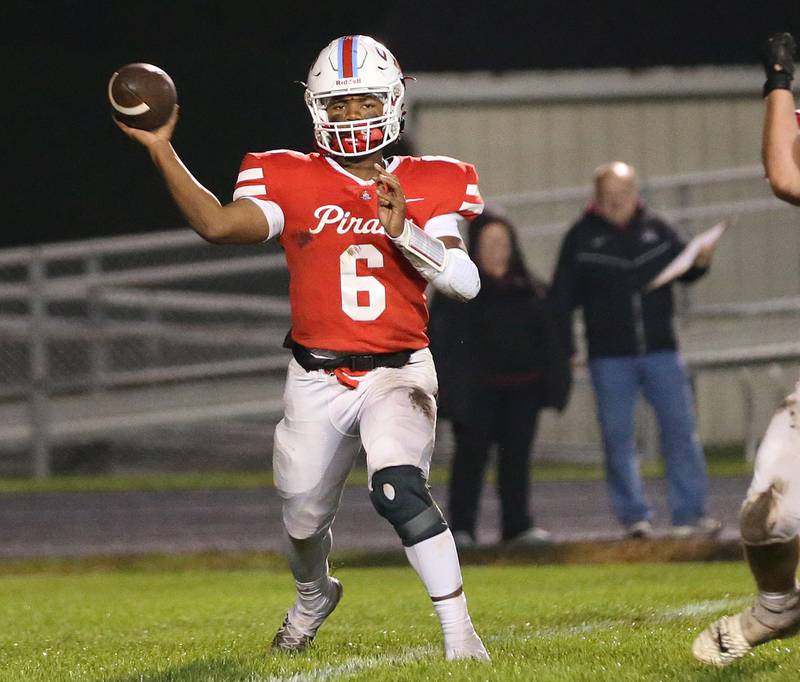 Ottawa quarterback Colby Mortenson throws a pass against Morris on Friday, Oct. 13, 2023 at King Field.