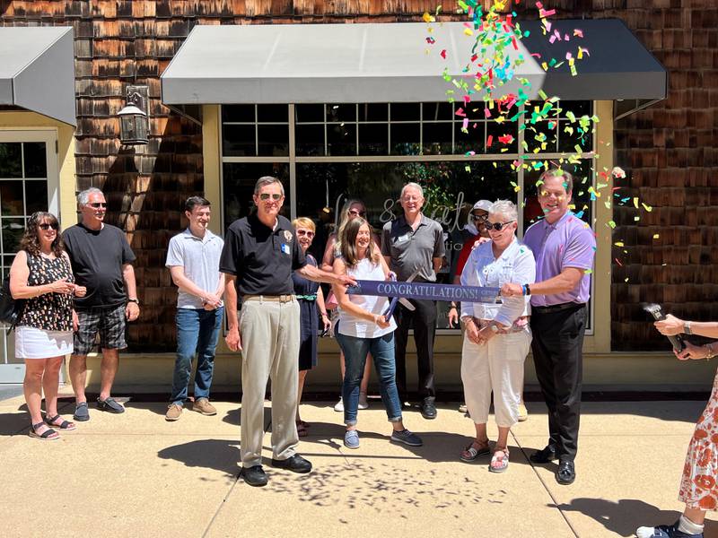 Lynne Ball, owner of Geneva's Liz & Kate Boutique, cut the ribbon at the Geneva Chamber of Commerce ribbon-cutting ceremony Friday, June 14, honoring the boutique's 10 years in business. The boutique is located at 407 S. Third St., Suite 174.