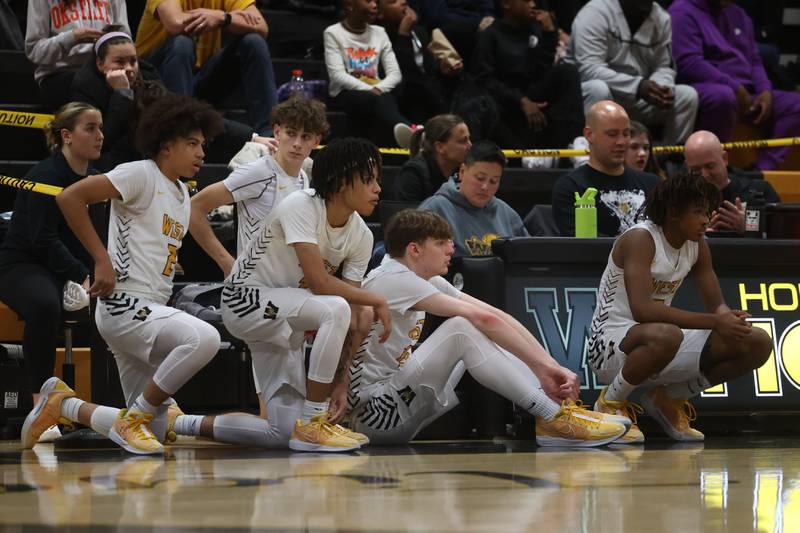 Joliet West starters wait to enter the game in the forth quarter after sitting out most of the second half against Yorkville on Friday, Jan. 5th, 2024. in Joliet.
