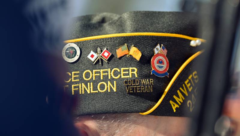 Patrick Finlon of Cary and of the AmVets Post #245 of Cary Grove holds the American flag for the opening ceremony of the Norge Ski Jump 121st Annual Winter Tournament on Feb. 1, 2026 at the Norge Ski Club, 100 Ski Hill Road, Fox River Grove.