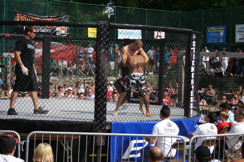 A fighter places a hold on his opponent during the XFO's Outdoor War at Sideouts Sports Tavern in Island Lake in 2010. The event returns to Sideouts Aug. 9 after a six-year hiatus.