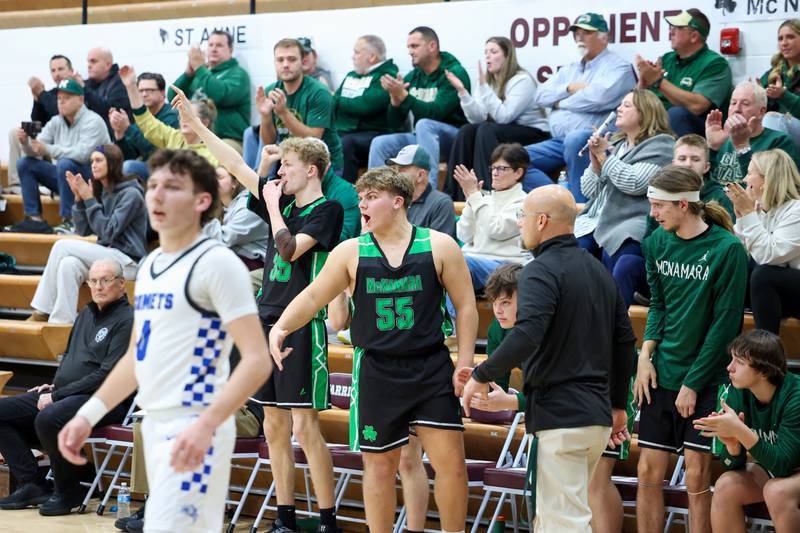 Bishop McNamara's Ian Irps, center, celebrates a 3-pointer during the Fightin' Irish's 62-41 victory over Clifton Central in the Watseka Holiday Tournament championship on Tuesday, Dec. 16, 2025.
