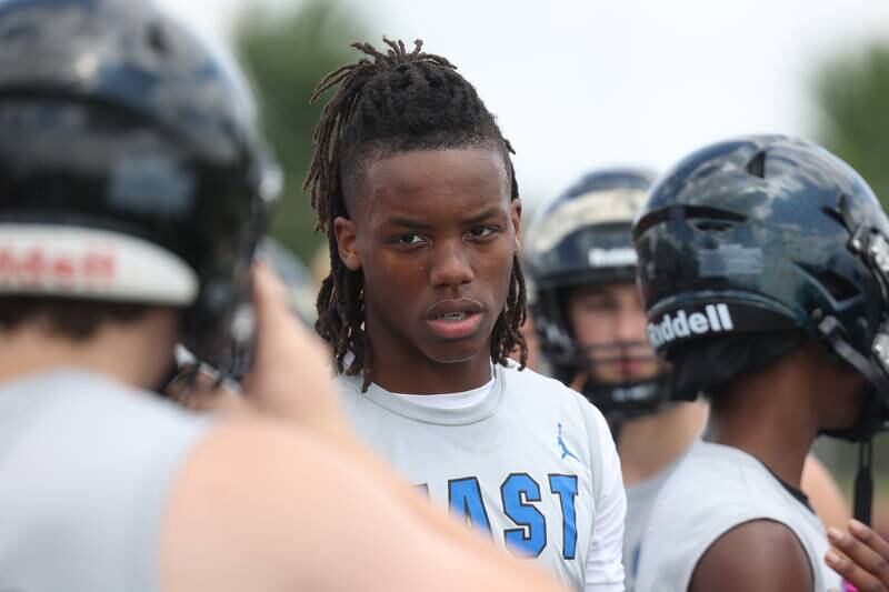 Lincoln-Way East running back Zion Gist stands on the sidelines as the defense runs plays during a 7-on-7 scrimmage at Lincoln-Way East on Tuesday, July 18th, 2023 in Frankfort.