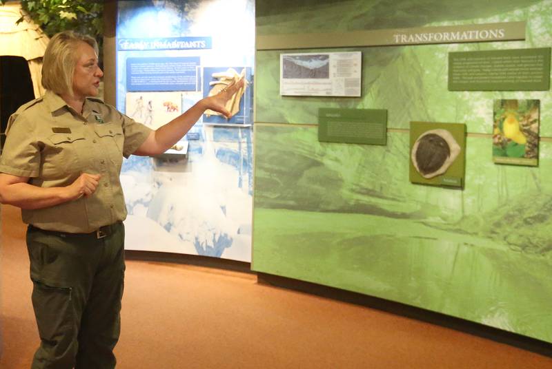 Lisa Sons, Illinois Department of Natural Resources coordinator, describes the updated panels in the museum on Thursday, May 8, 2025 at the Starved Rock Visitors Center. The Starved Rock Foundation announced the completion of significant upgrades to the Starved Rock State Park Visitor Center, just in time for the park’s busy season. The $40,000 project includes all-new lighting installations and refreshed museum exhibits, enhancements designed to create a brighter, more welcoming space that deepens the educational and immersive experience for all who visit.