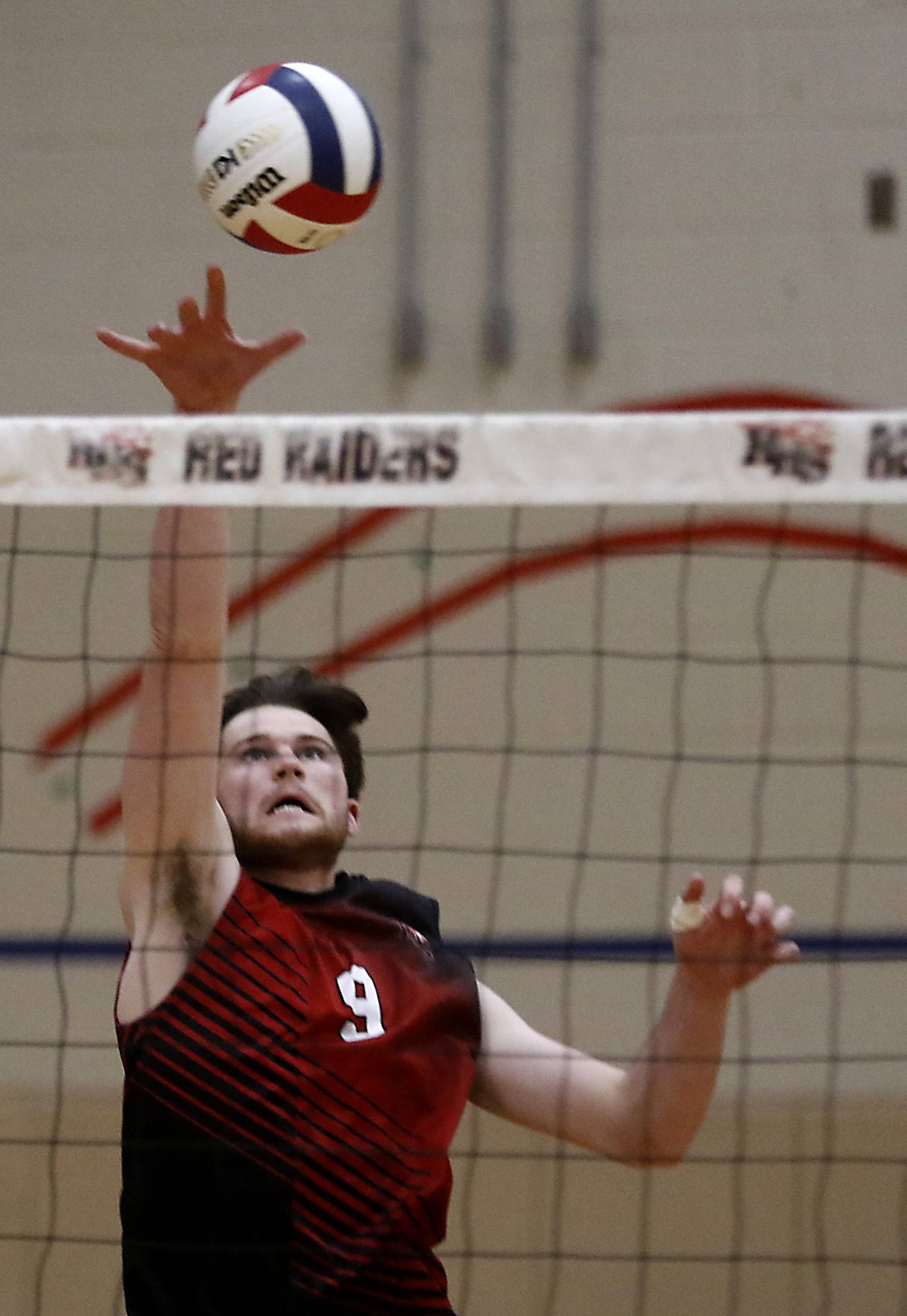 Huntley's Jayden Bell hits the ball over the net during a nonconference boys volleyball match against St. Charles North Monday, May 8, 2023, at Huntley High School.