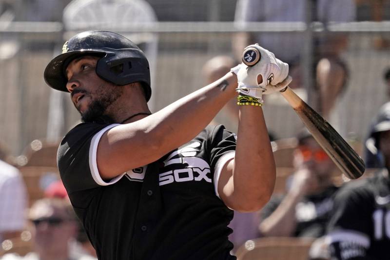 Chicago White Sox first baseman Jose Abreu bats during a spring training baseball game against the Oakland Athletics on April 1, 2022 in Glendale, Ariz.