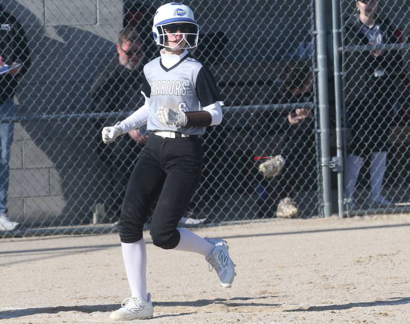 Woodland/Flanagan-Cornell's Addyson Ewing scores a run against St. Bede on Tuesday, April 8, 2025 at Woodland High School.