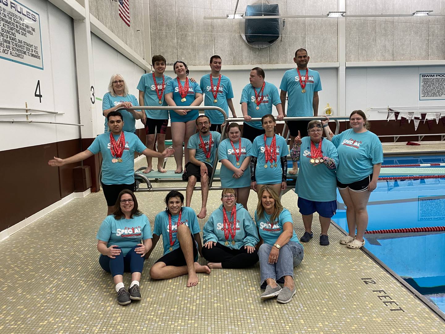 From left to right, top row: Coach Deidre Hicks, Marcus Bennett, Layla Hicks, Ronnie Peterson, Keith Siron, Drew Kirkman. Middle row: Nathanial Graziano, Nick Holm, Shannon Wexell, Anna Gilchrist, Lori Harvill, and Lifeguard Jordan Countryman. Bottom row: Coach Tina Nall, Dominyk Zavala, Brooke Brummel and Coach Lynda Kirkman.