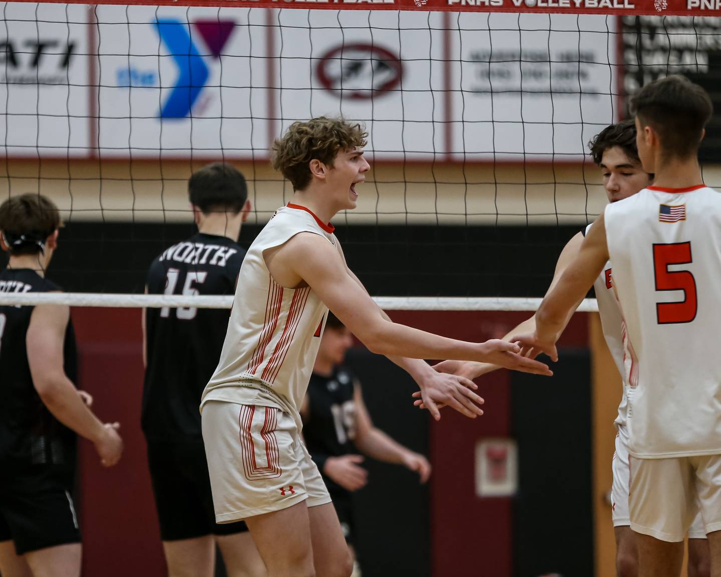 Plainfield East's Braxton Francis (4) celebrates a point during volleyballl match between Plainfield East at Plainfield North.  May 18, 2023.
