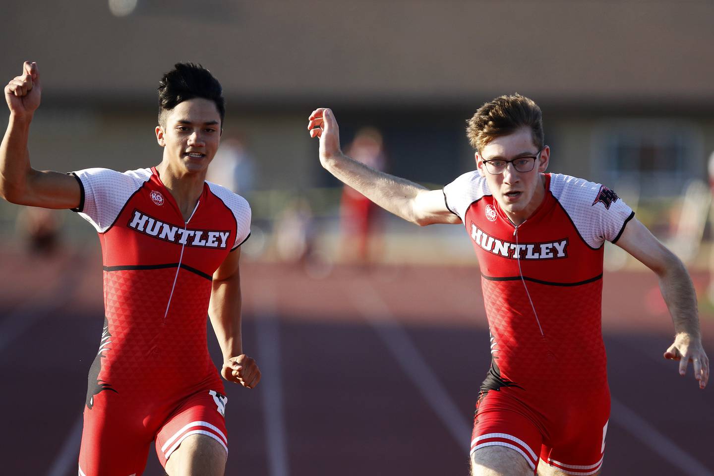 Huntley's Evan Gronewold, left, and Paul Kerber sail into the finish in the 100 meter dash during the boys class 3A track and field sectional held at Huntley High School on Wednesday, June 9, 2021 in Huntley.